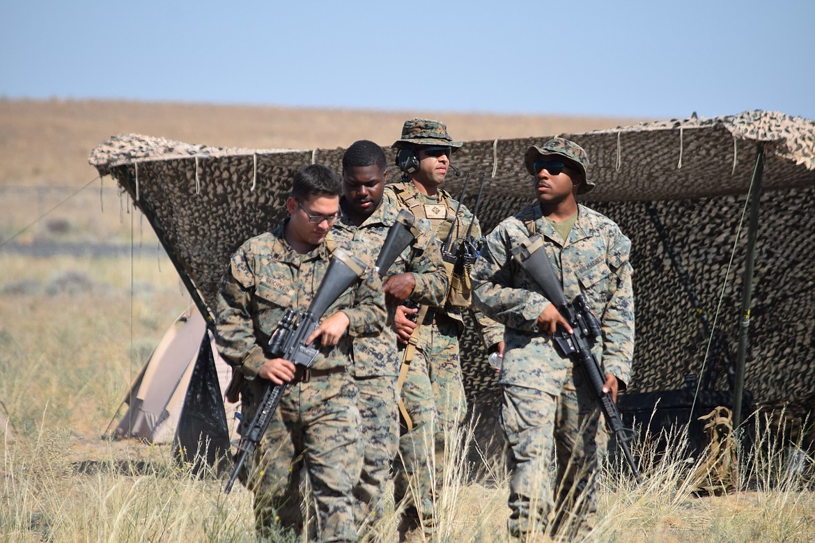 A group of Marines preparing for the Summer Fury 21 exercise at the Grant County International Airport early Thursday.