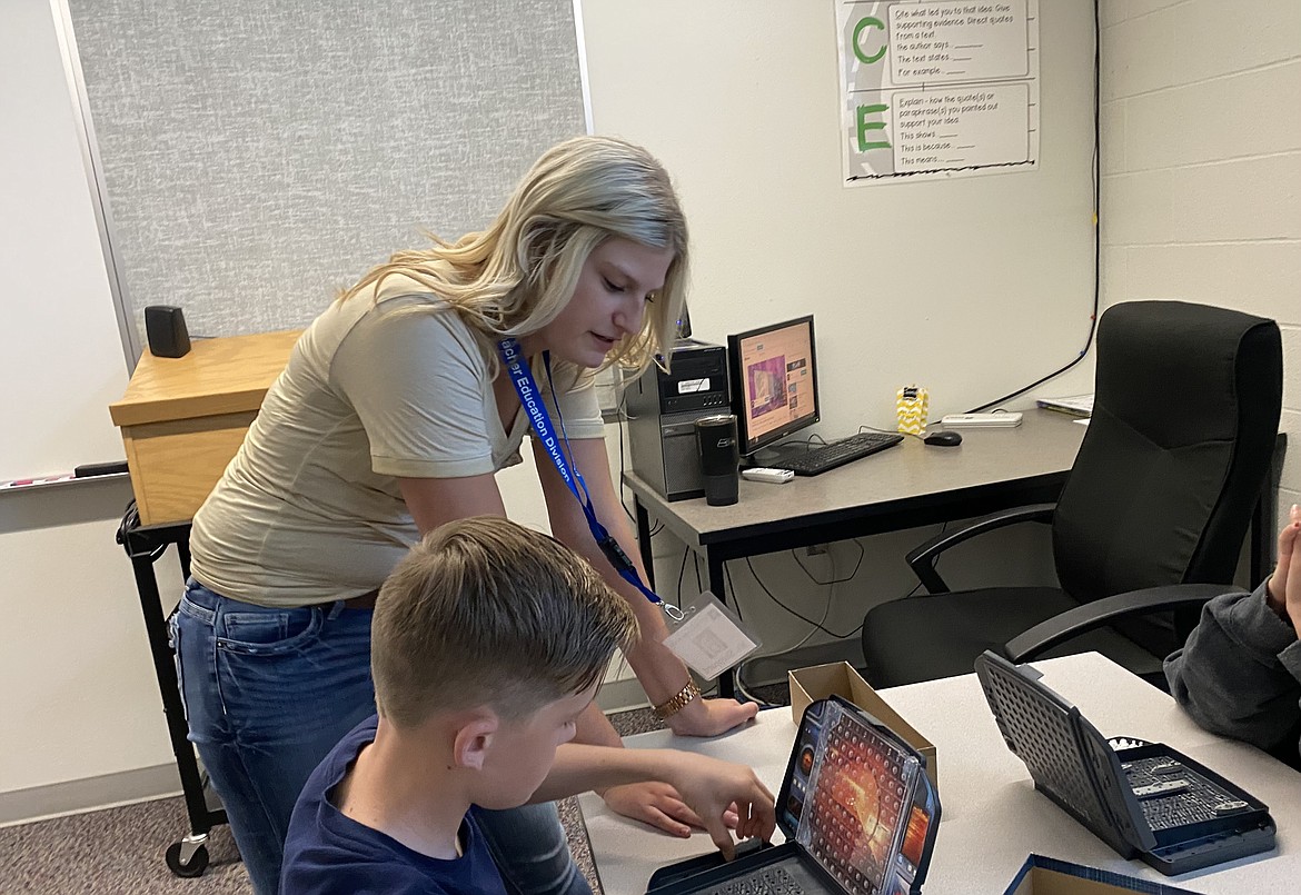 Hannah Sheppard, an LCSC student, talks with elementary learners during the first 2021 PACE session - a program that provides educators-in-training the hands-on experience needed for the job. (MADISON HARDY/Press)