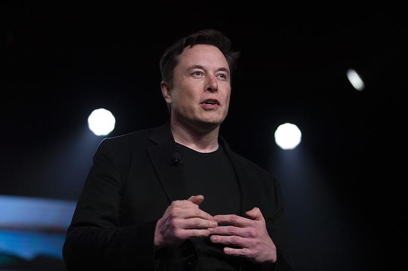 FILE - In this March 14, 2019, file photo, Tesla CEO Elon Musk speaks before unveiling the Model Y at the company's design studio in Hawthorne, Calif. (AP Photo/Jae C. Hong, File)