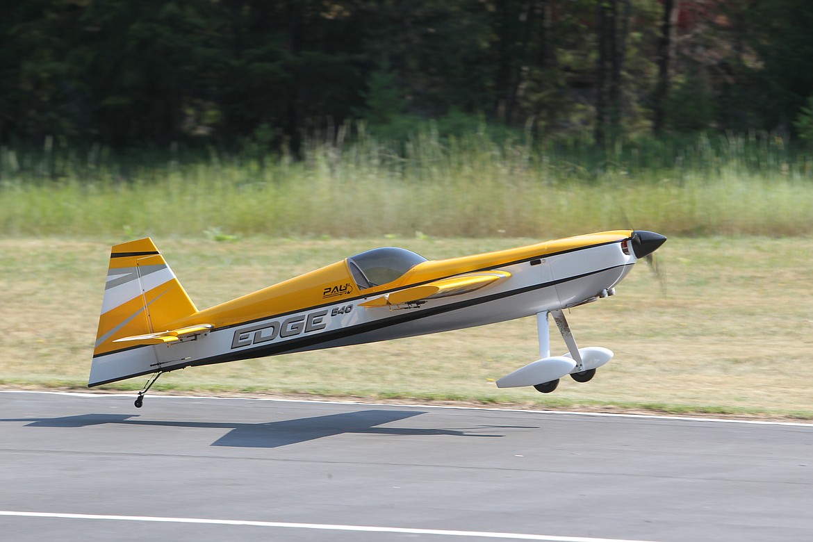 Ken Huber's PAU Edge 540 RC plane comes in for a landing during the Kootenai RC Flyers' Fun Fly event on July 10. (Will Langhorne/The Western News)