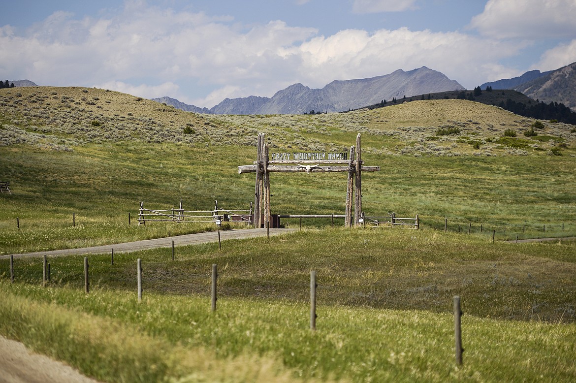 A road leading into the Crazy Mountain Ranch is seen on July 6, 2021, near Clyde Park, Mont. A subsidiary of the company that owns a luxury Montana resort has bought the 18,000-acre (7,300 hectare) ranch in south central Montana. (Rachel Leathe/Bozeman Daily Chronicle via AP)