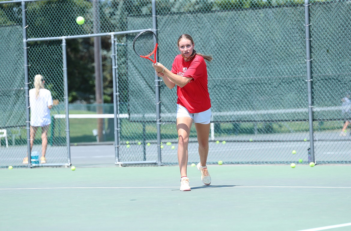 Neva Reseska hits a forehand on Monday.