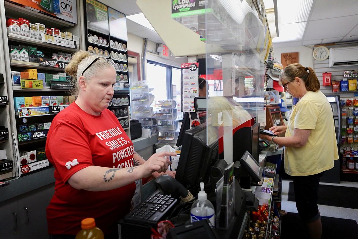 Charity Neal, rings up a customer Thursday afternoon at Your Turn Mercantile.
Mackenzie Reiss/Bigfork Eagle