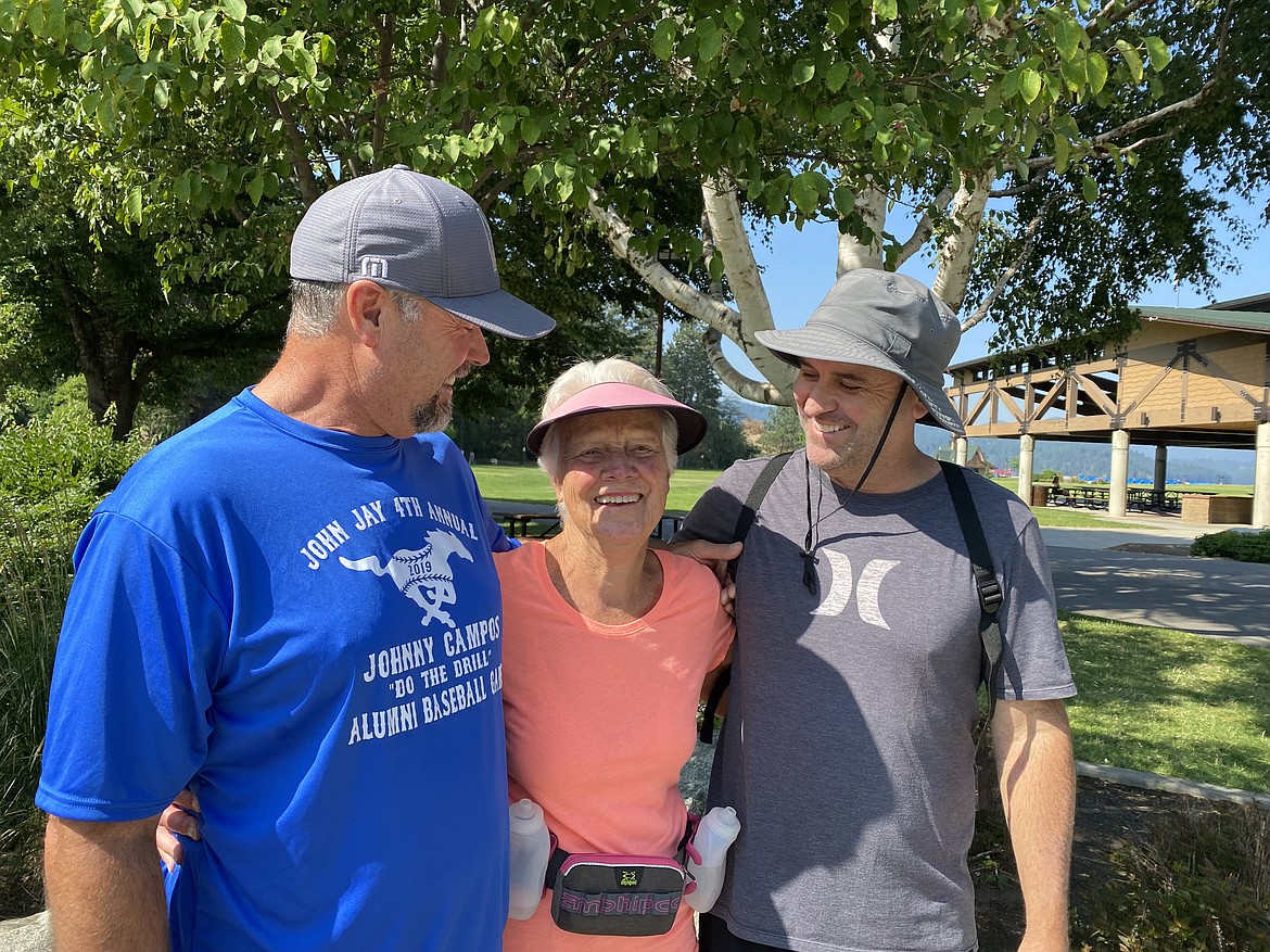 Bonnie Sandford's two sons, Don, left, and Doug celebrated Bonnie's 80th birthday Monday morning by walking the last five miles of a virtual half marathon event. (MADISON HARDY/Press)