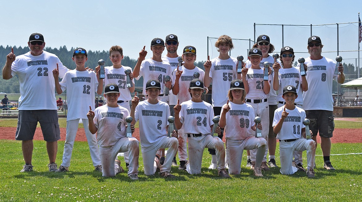The Whitefish 12U baseball team went 5-0 in the state tournament and won the championship game over Helena on Sunday at Smith Fields in Whitefish. From left to right, back row, coach Ray Queen, Landon McGavin, Gustav Alevizos, Talus Piatkowski, coach Rich Piatkowski, Luke Dalen, Jett Pitts, Cullen Wallace, coach Josh Mintz, Ashtyn Mintz, and coach Chap Godsey; front row, Will Sisson, Drew Queen, Reyd Hobart, Carter Godsey, and Finn Hobart. (Courtesy photo)