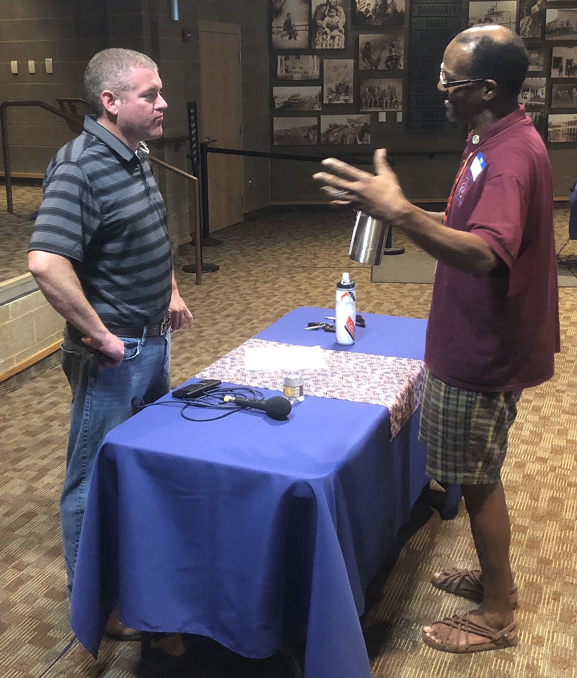 James McDay (right), founder of TOC Diversity Resource and the driving force behind bringing a local NAACP chapter to Kootenai County last year, spoke with Rep. Paul Amador before a town hall in Coeur d'Alene on June 29.