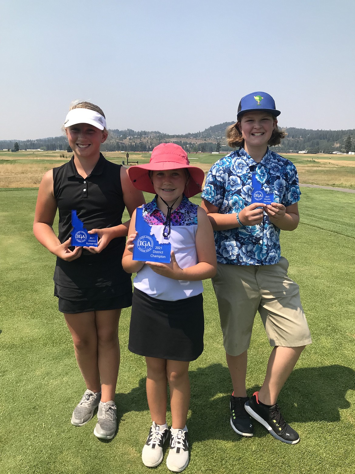Courtesy photo
From left, Ella Wilson (Hayden Lake) took second place, Kamdyn Kelley (Lewiston) took first place and Jossetta Williams (Hayden Lake) took third place in the girls 10-12 age group at the Idaho Golf Association district championships Monday and Tuesday at The Links Golf Club in Post Falls. All these girls will compete in the state championship at Canyon Springs Golf Course in Twin Falls.