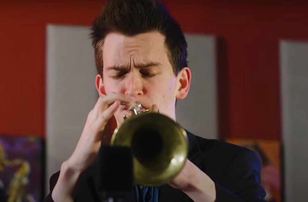 Nathan Fisher plays trumpet during a performance for KNKX radio in Tacoma.