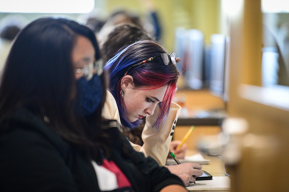 Flathead High School student Athena Wallace works inside a social studies and business classroom during the Kalispell Public Schools' summer school program at Glacier High School on Tuesday, July 13. (Casey Kreider/Daily Inter Lake)