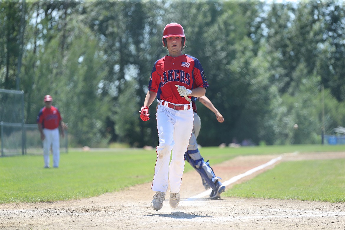 Zach Leverich scores a run on Friday.