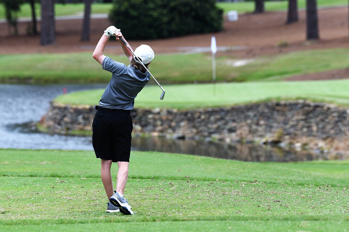 Bulldog Bjorn Olson watches his shot while recently playing at the High School Golf National Invitational at Pinehurst Resort. (Jeff Doorn photo)