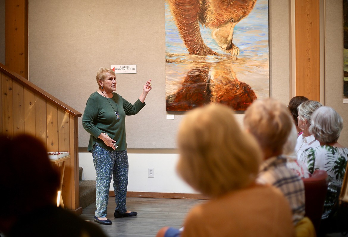 A dozen attendees listen to artist Sunnie LeBlanc speak about her oil paintings during an easel talk at the Bigfork Art and Cultural Center Thursday, July 16.
Mackenzie Reiss/Bigfork Eagle