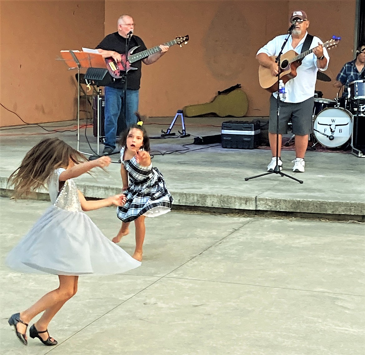 Two girls show off their moves during the Good Old Days community dance. (Carolyn Hidy/Lake County Leader)