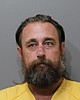 Man charged with stalking, again