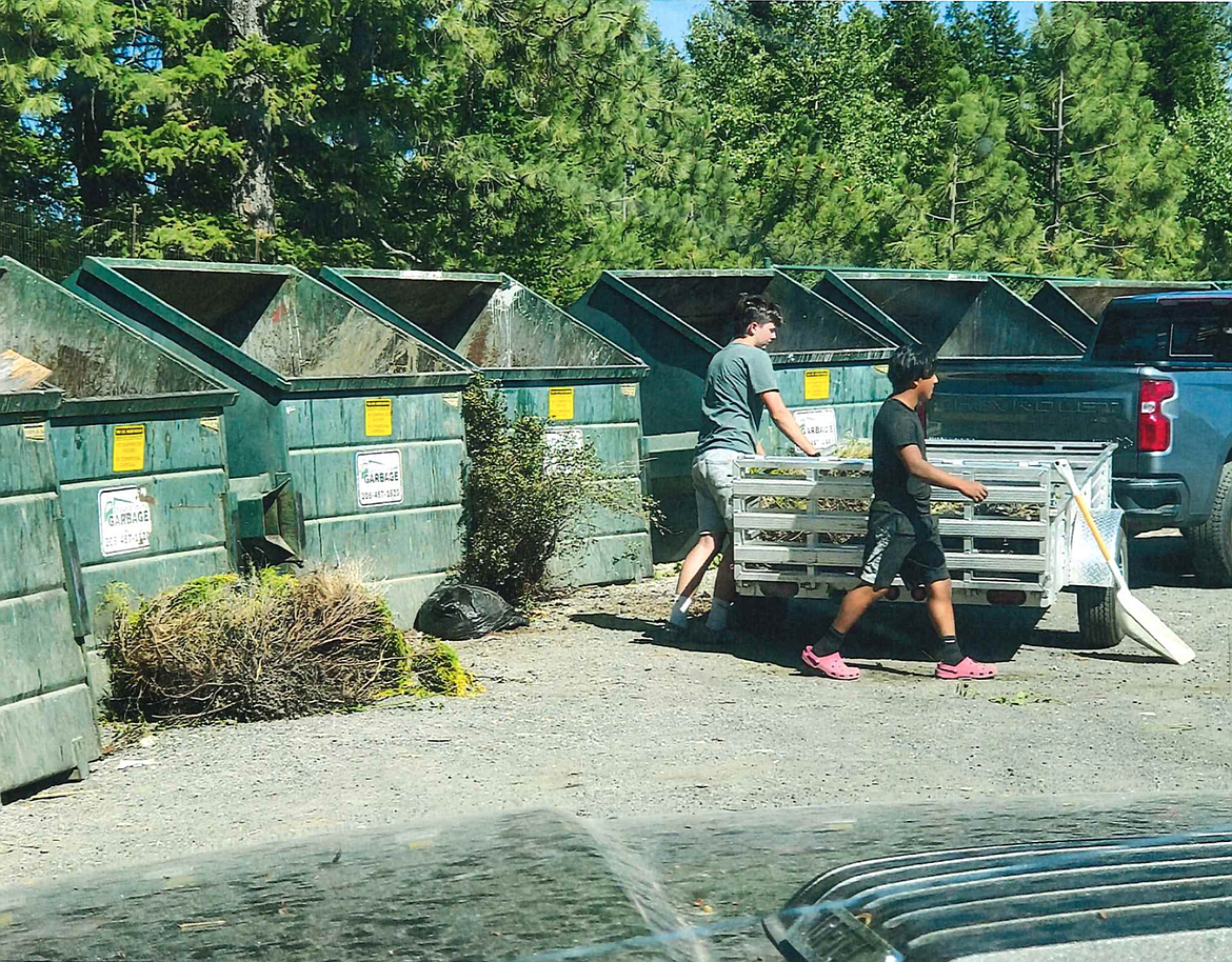 Images from Jim Magnuson show individuals who appear to be contractors leaving landscape waste on the ground near rural collection sites. Photo courtesy Jim Magnuson.