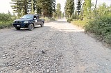 Plans to fix a short, wretched road to Polebridge entrance ‘on life support’