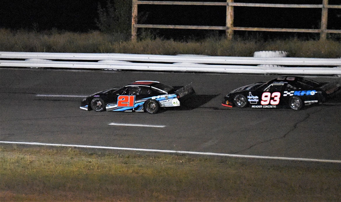 BJ Tidrick takes over the lead from Dave Garber with about 60 laps to go. (Scot Heisel/Lake County Leader)