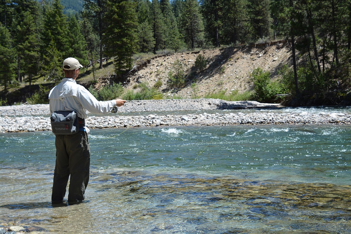 Idaho Fish and Game
Trout angler fishing South Fork Payette River, Southwest Region.