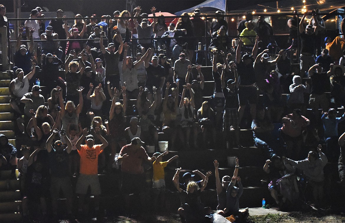 The crowd at Mission Valley Super Oval got the wave going near the end of the Montana 200. (Scot Heisel/Lake County Leader)