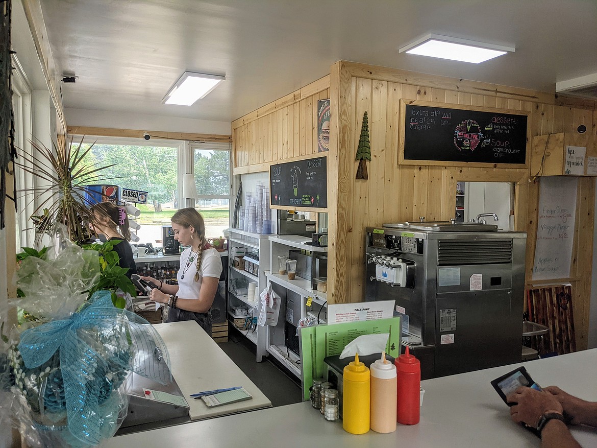 Kaitlyn and Madison Meier assist customers at the Tall Pine.