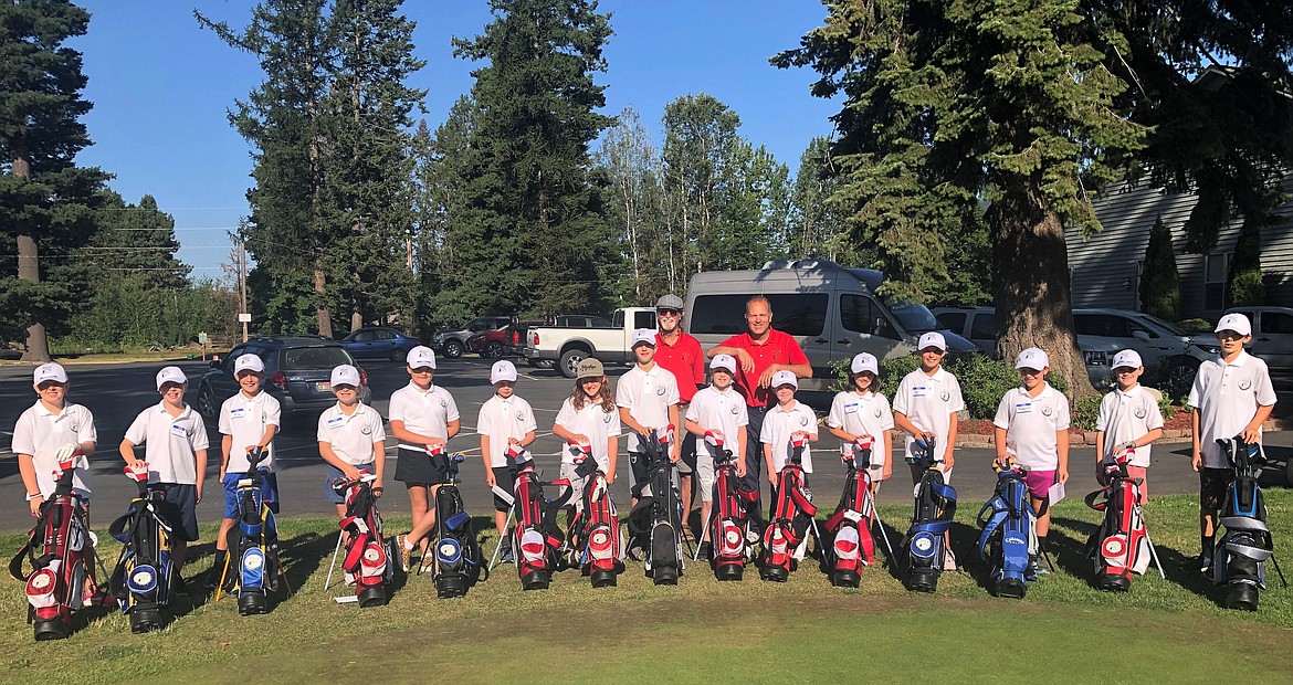 A group of participants in the Sandpoint Elks' annual Hook a Kid on Golf program pose for a photo.