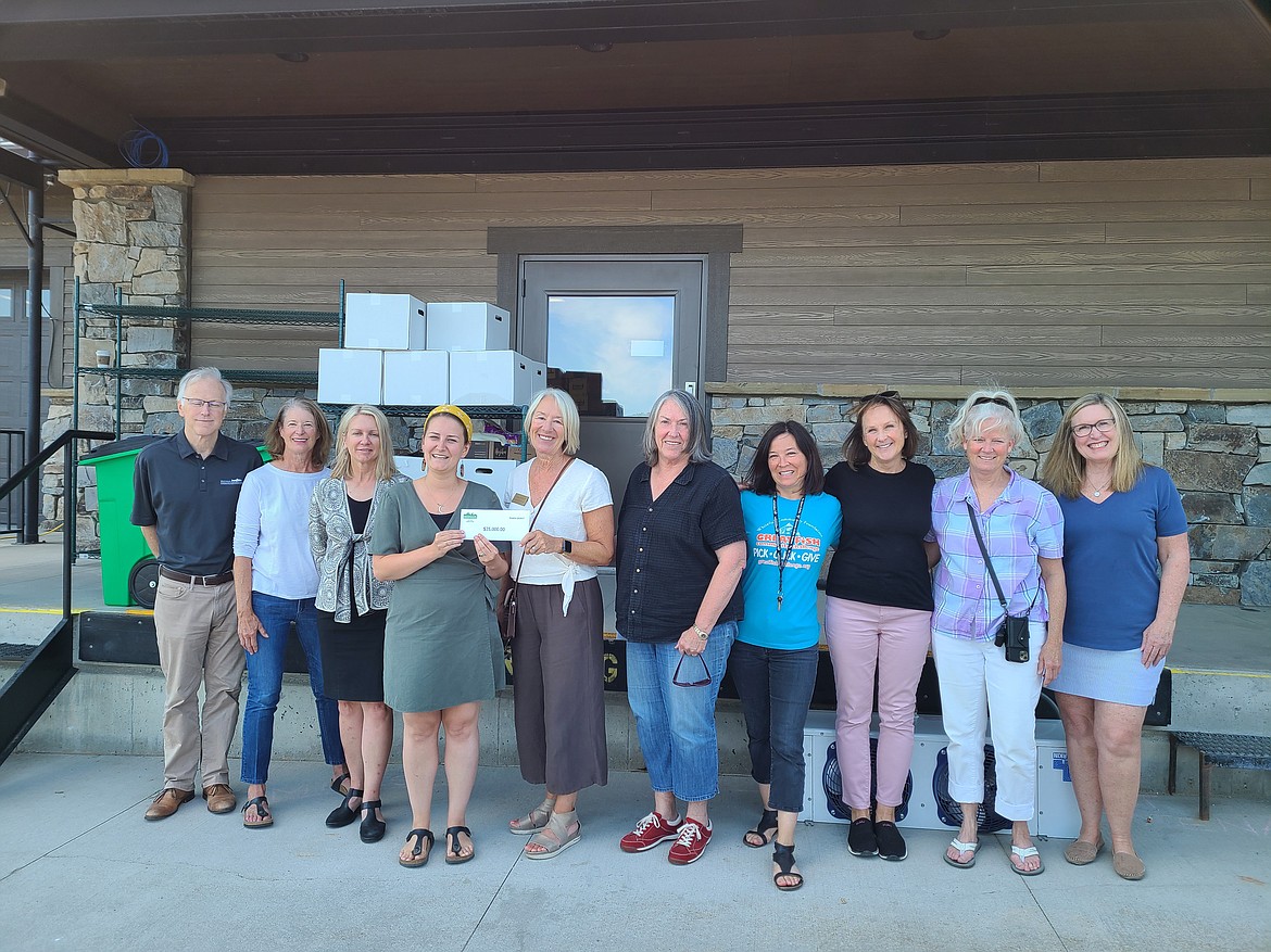 Whitefish Community Foundation presented a $25,000 grant to the North Valley Food Bank July 22 to support the organization’s facility expansion project. Pictured from left to right are David Dittman, Betsy Bayne, Linda Engh-Grady, Sophie Albert, Linda Maetzold, Carol B. Atkinson, Lynnette Donaldson, Ardy Whisler, Elizabeth Temple and Maureen Casey.