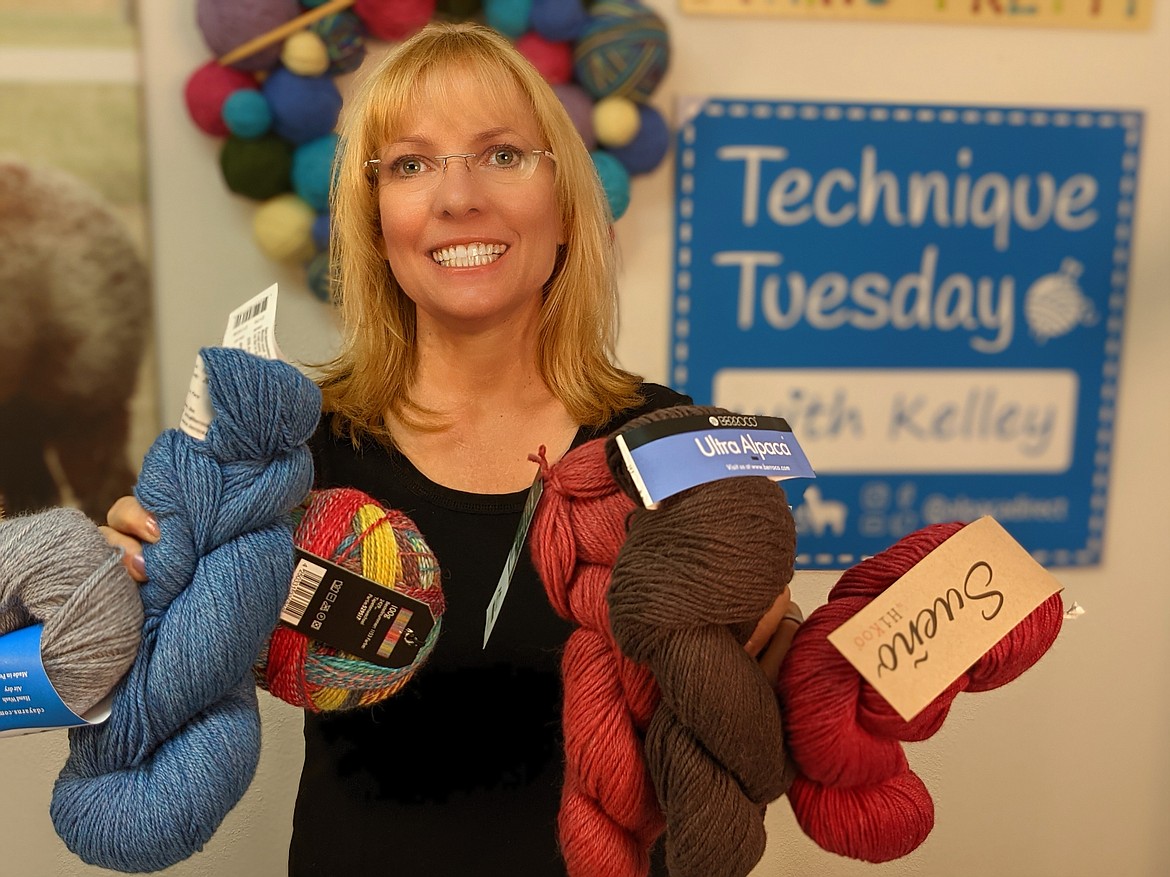 Courtesy photo
Owner Kelly Hobart holds some of the products available at Alpaca Direct and Croc Coatings, which has moved to 4290 W. Riverbend Ave. in Post Falls.