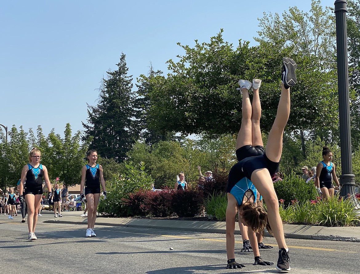 Members of Technique Gymnastics wowed the crowd with their tumbling skills as they moved down Government Way as part of the 2021 Hometown Heroes Hayden Days parade celebration. (MADISON HARDY/Press file)
