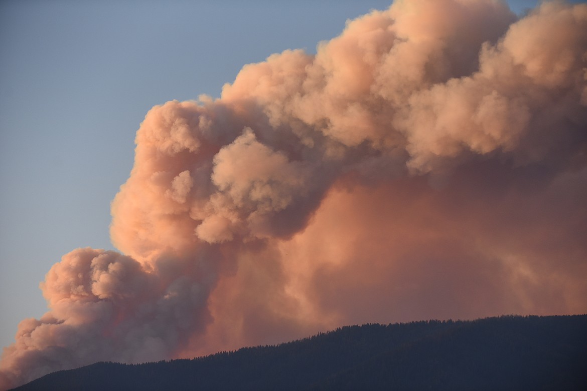 Heavy smoke pours off the Thorne Creek Fire Friday evening after fire crews used aerial ignitions in strategic locations to moderate fire behavior. (Scott Shindledecker/Valley Press)