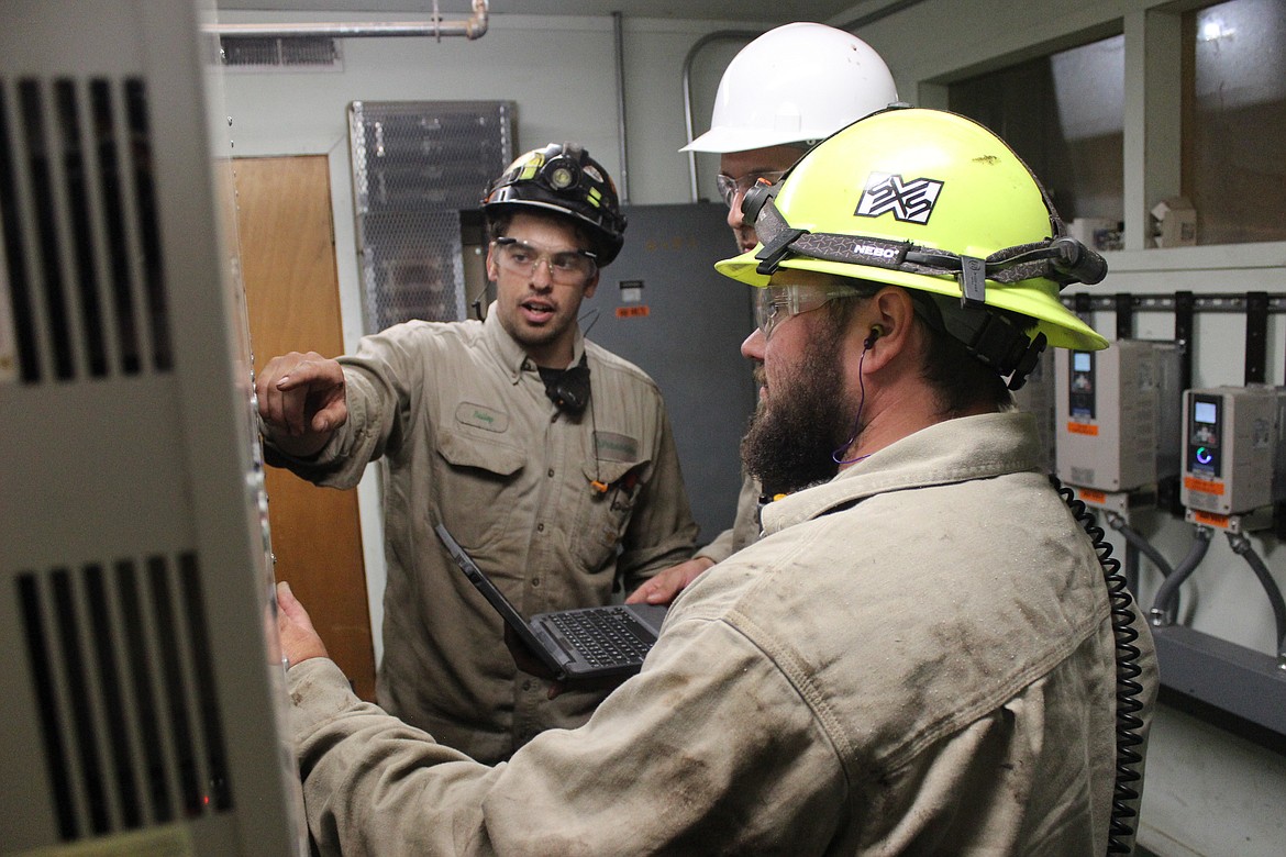 Bailey Brown (far left), 26, from Coeur d’Alene, doing his job at the PotlatchDeltic mill in St. Maries. Brown just finished the NIC Workforce Training Center apprenticeship program, earning his journeyman’s license in the process. He’s pictured with Harrison Escobar (middle), 32, from Nampa, and Danny Hilde, 32, from St. Maries, who are currently enrolled in the program.