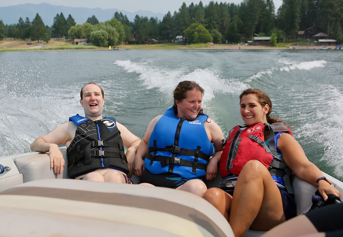 Derek Ball, Leanne Shephard and Melissa Petersen enjoy the boat ride back to shore after an afternoon water skiing on Echo Lake with DREAM Adaptive Recreation.
Mackenzie Reiss/Bigfork Eagle