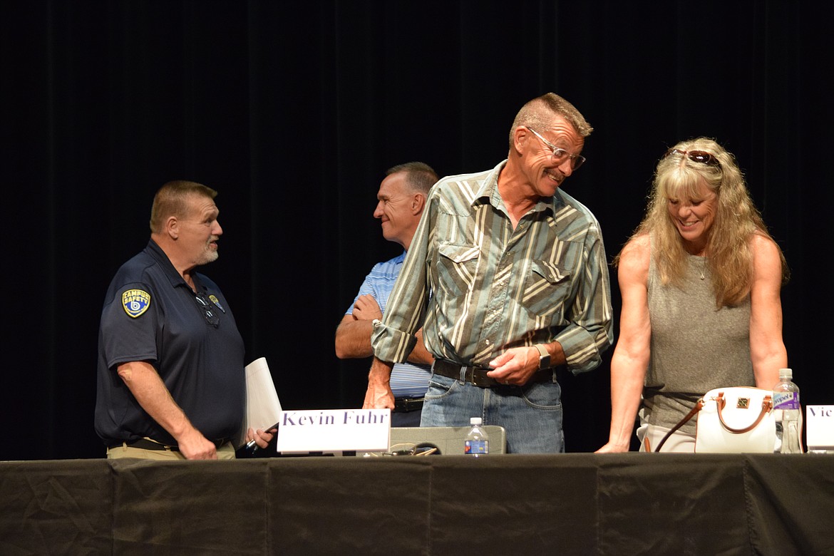 Moses Lake School Board candidates (left to right) James Liebrecht, Kevin Fuhr, Paul Hill and Vickey Melcher chat following the end of Monday’s candidate forum sponsored by the Moses Lake School District.