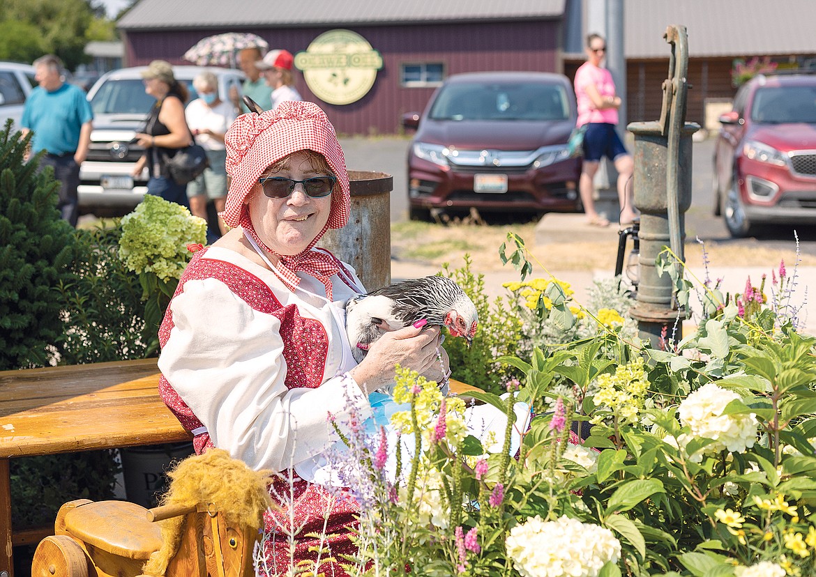 Amongst the flowers on the Heaven's Peak Healthcare float.