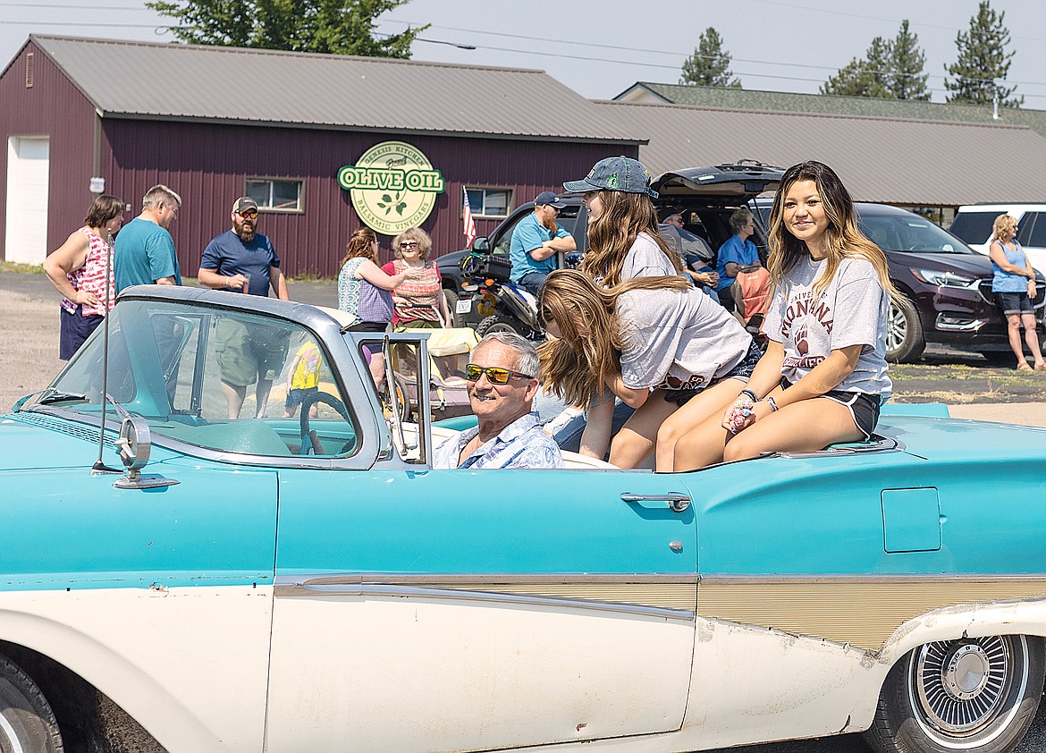 Young ladies enjoy a ride through the parade.