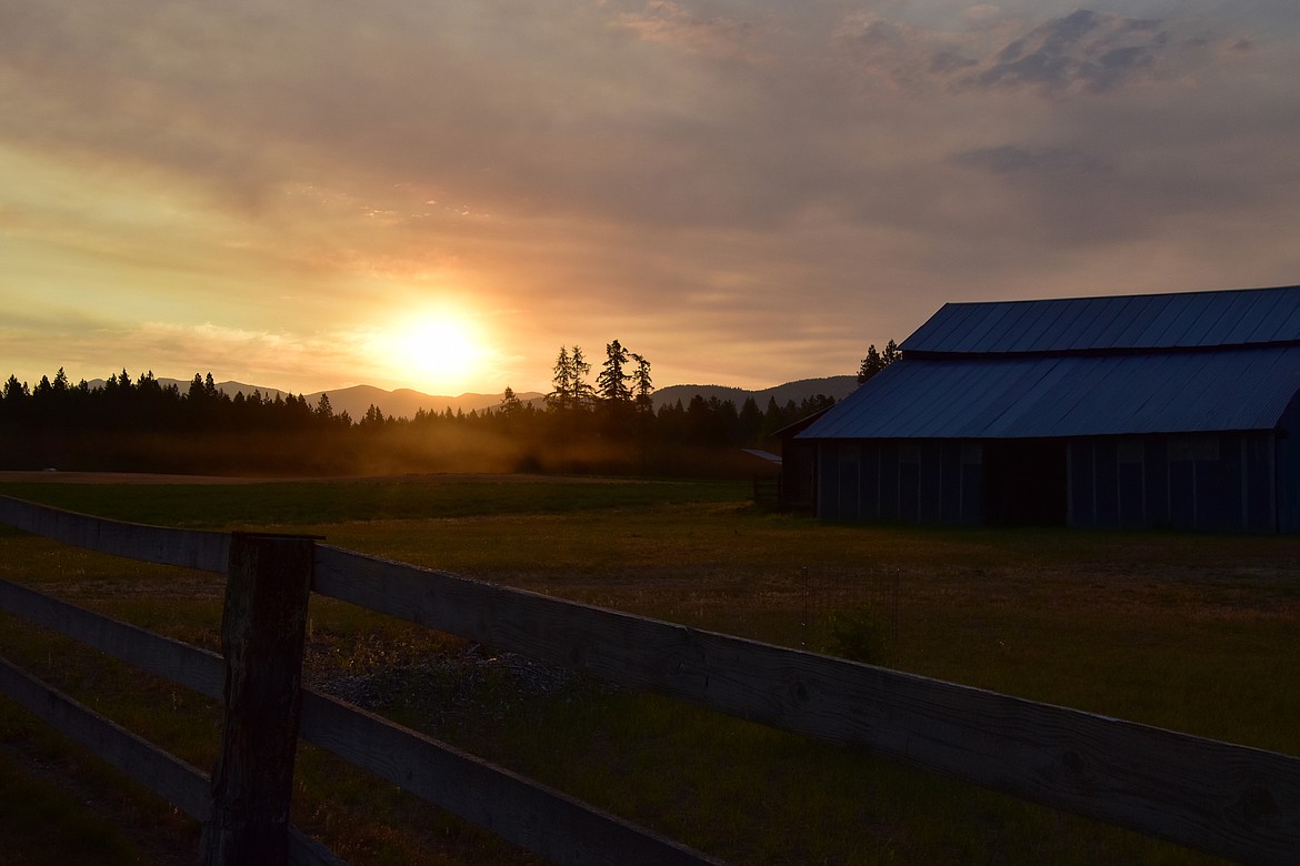 "I absolutely love this picture I was blessed to take on Wednesday, July 7, at 5:36 a.m. of our barn, etc.," writes Robert Kalberg in sharing this photo. "God is so good!"