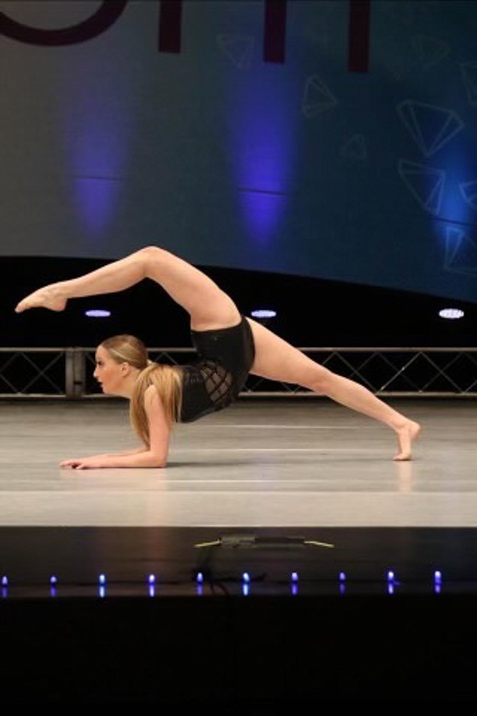 Reegan Radach, a student at The Ballet Academy of Moses Lake, performs on stage.