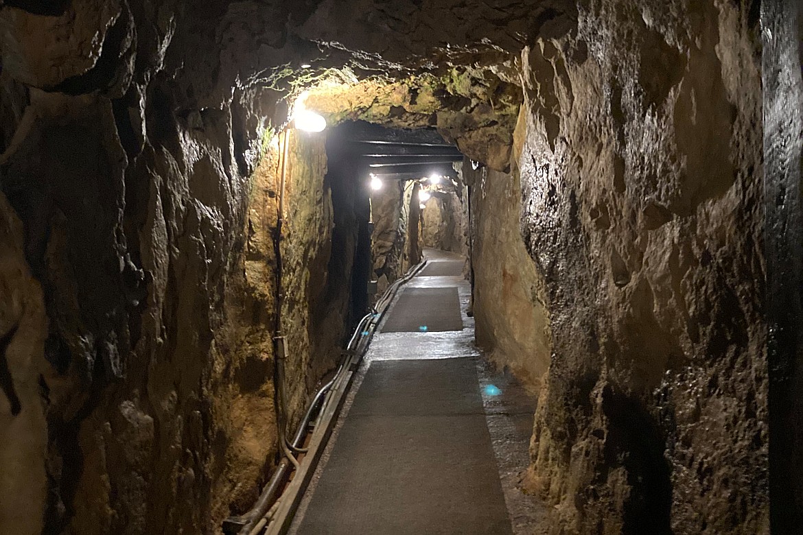 Merry Widow Health Mine is in a narrow canyon in Basin, Mont., where people pay to breathe, drink and soak in the old mine's radioactive radon. (Katheryn Houghton/Kaiser Health News)