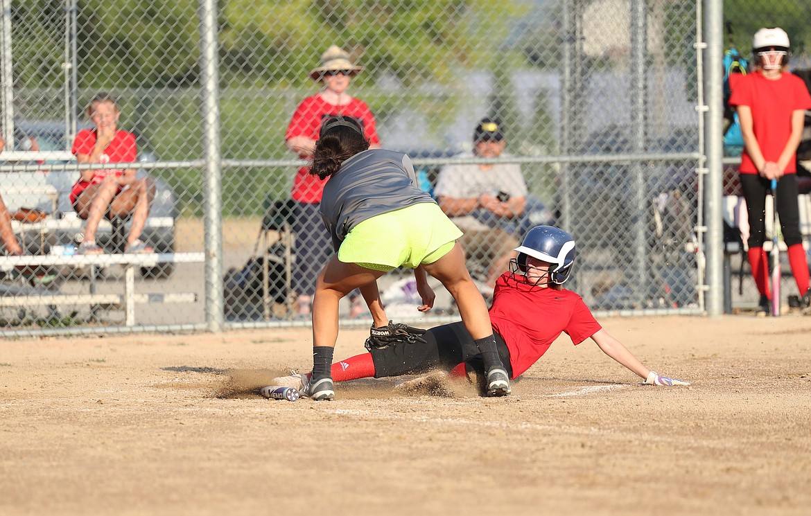 Halle Blood slides into home to score a run on Thursday.
