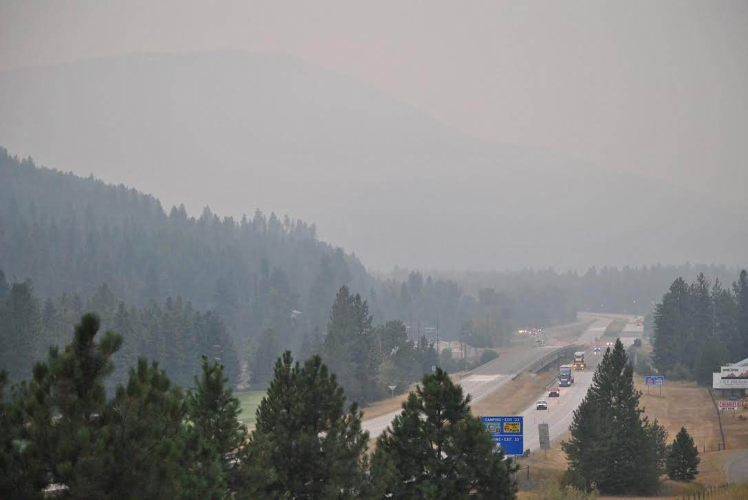 On the morning of July 30, air quality in St. Regis was listed at moderate. By the evening dense smoke blanketed the valley and air quality conditions decreased to very unhealthy. From the hill near the Nugget Campground in town residents looking over Interstate 90 can easily see Boyd Mountain in the distance on a clear day, here you can barely see its outline. (Amy Quinlivan/Mineral Independent)