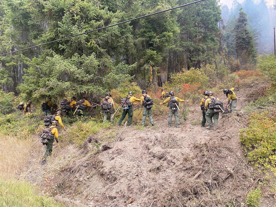 Firefighters build line on the Boulder 2700 fire in Lake County on Monday, Aug. 2. The fire burned more than 1,000 acres and several homes Sunday.(Inciweb photo)