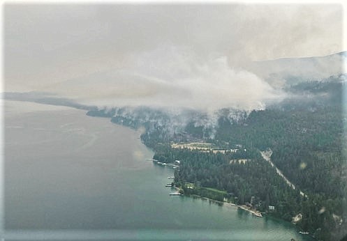 Smoke from the Boulder Fire rises from Finley Point on Sunday morning. (Courtesy of CSKT Division of Fire)