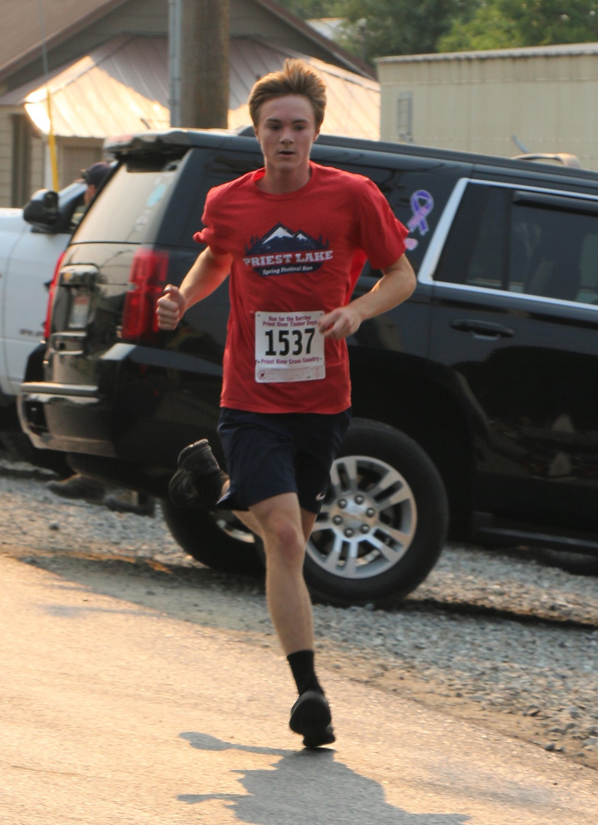 Ethan Korff competes in the 5K during Saturday's Run for the Berries. He finished fourth overall.