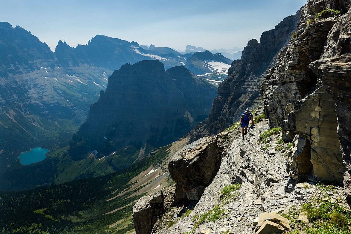 Greg Burfeind hikes along a goat trail on the eastern face of Mount Cleveland, moments before he and Noah Couser decided to turn back during an attempt to climb the six highest peaks in Glacier National Park in six days. (Courtesy of Noah Couser)