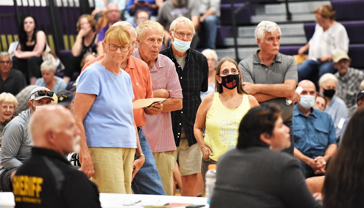 Members of the audience lined up to pose questions on the microphone at the end of Monday's meeting. (Scot Heisel/Lake County Leader)