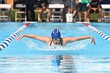 Swim team hosts state meet, takes fourth