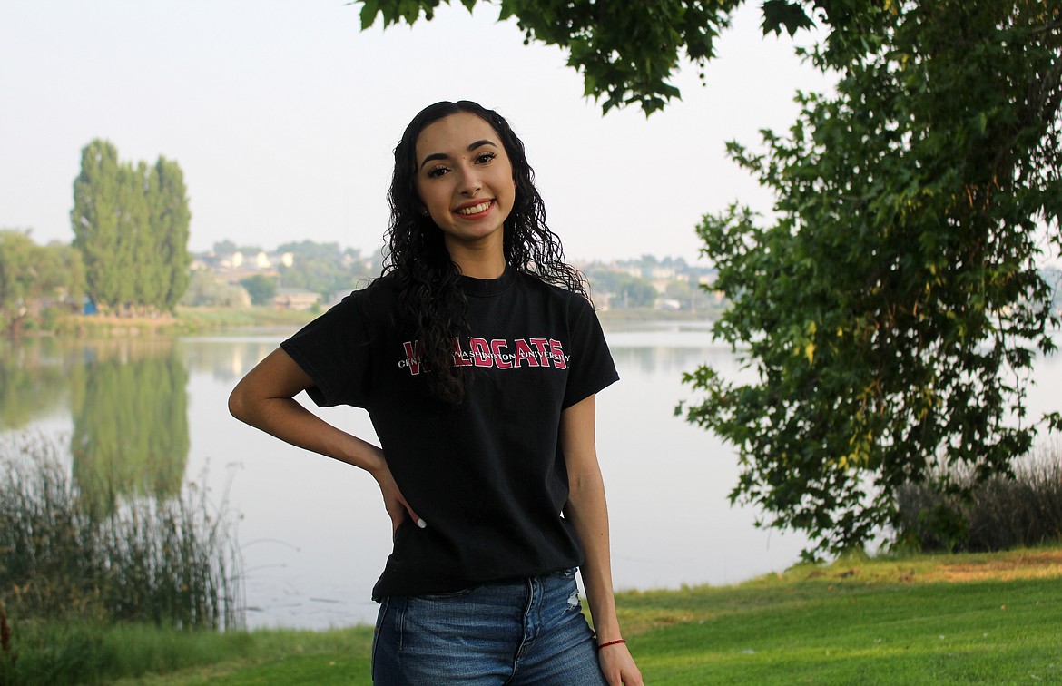 Darianna Vela of Moses Lake poses for a photo by the lake at McCosh Park in Moses Lake Tuesday afternoon.