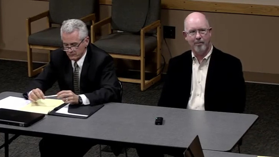 Kootenai County Prosecuting Attorney Barry McHugh and Coroner Warren Keene sit for interview with the Optional Forms of Government commission as part of investigative study. Photo courtesy the Kootenai County Youtube channel.