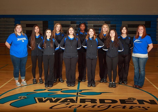 Darianna Vela, front row left, poses with her Warden High School dance team during her junior year.