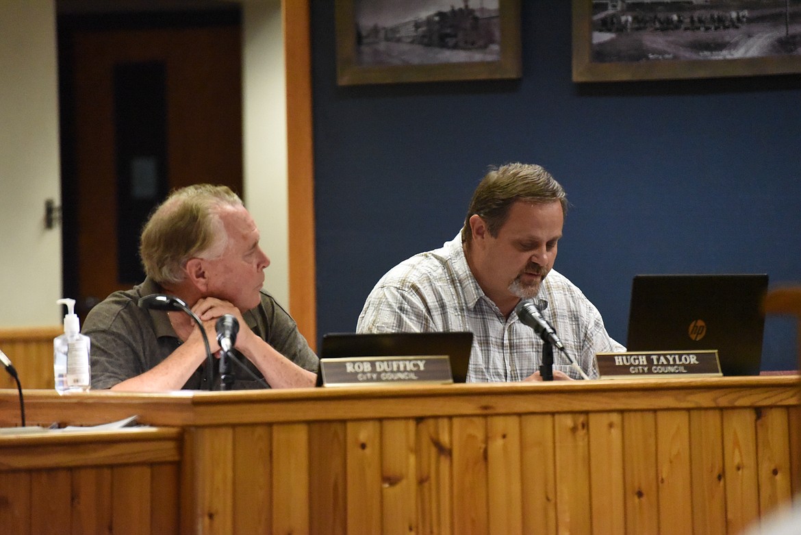 City councilors Rob Dufficy and Hugh Taylor joined colleagues Gary Beach and Brian Zimmerman on Aug. 2 in voting against a proposal to hold a mail-in municipal election in November. (Derrick Perkins/The Western News)