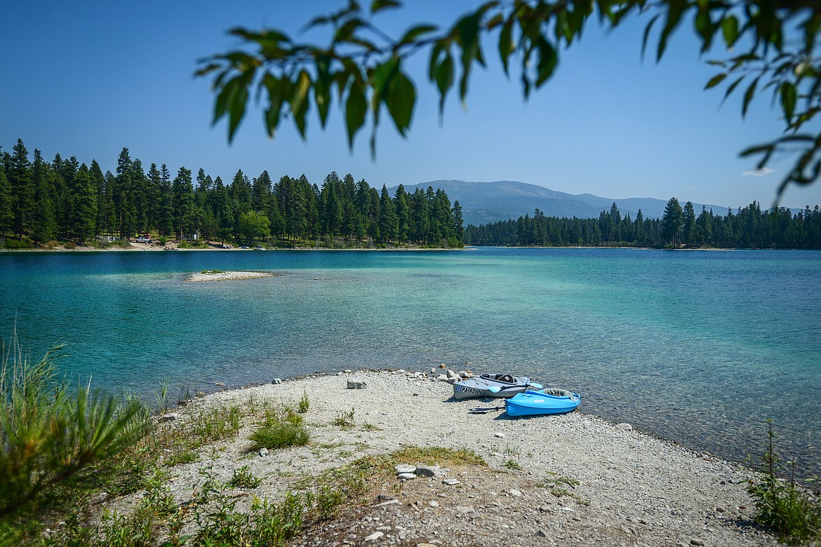Our kayaks sit along the shoreline of a small island at Horseshoe Lake in Lincoln County on Sunday, July 25, 2021. (Casey Kreider/Daily Inter Lake)